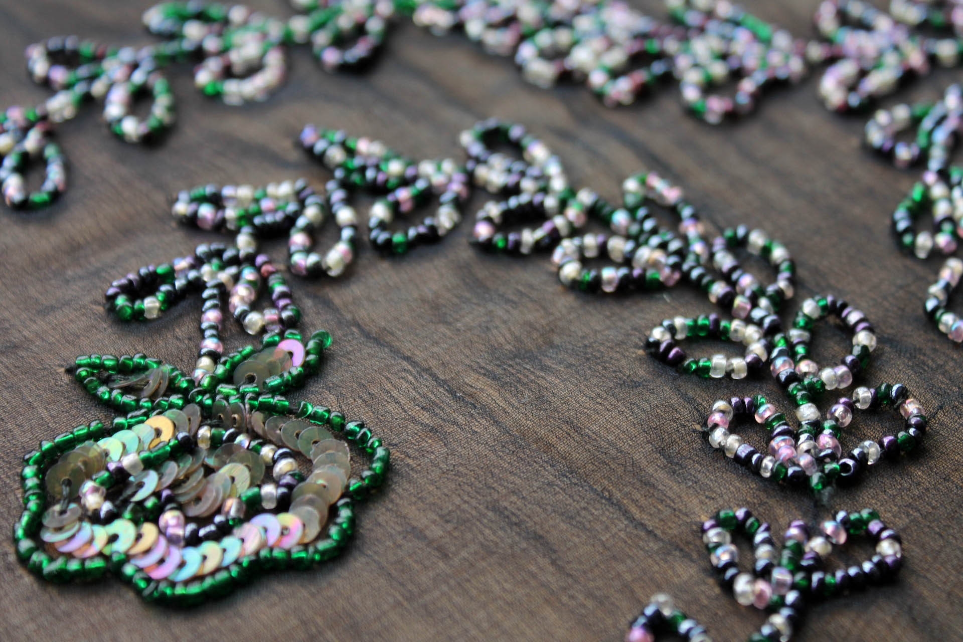 Black chiffon with flowers made from purple black green and clear