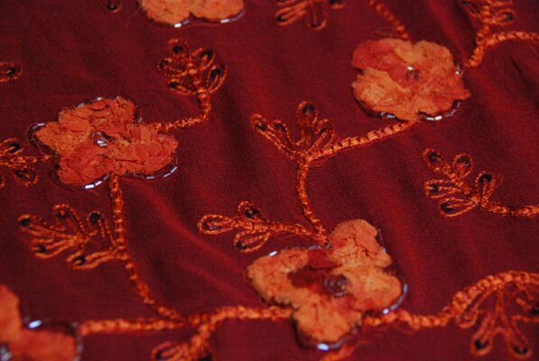 Red Chiffon with Orange Chiffon Flowers and Beading and Sequins fabric