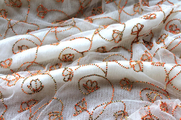 Cream Tulle Beading with Double Tone Green and Orange Beads fabric