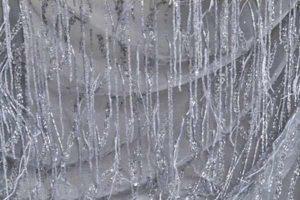 Beaded and Sequinned Nylon Tulle with Tassle Strings of Beads - Pale Grey fabric