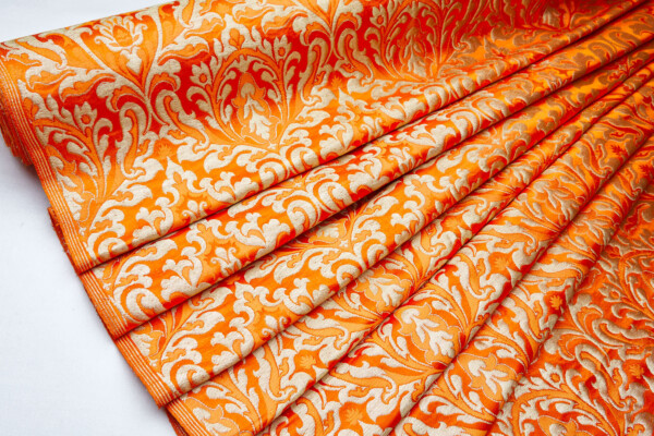 Heavy Banaras Brocade in an Orange and Gold Dense Pattern fabric
