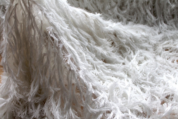"Faux Feather" Viscose Fringing on Tulle - Ivory fabric
