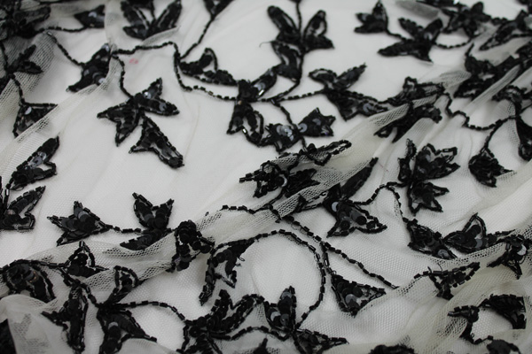 Black Ivy Beading On Ivory Tulle fabric