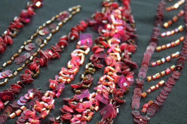 Black Chiffon with Red and Purple Sequinned Pattern fabric