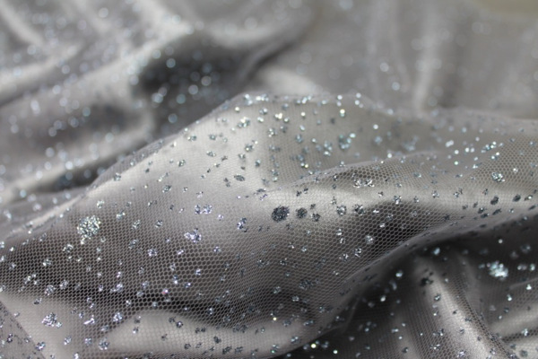 Glitter Spray Tulle - Grey on Grey fabric