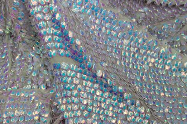 Dragon Scale Sequin in Iridescent White On Silk Chiffon fabric