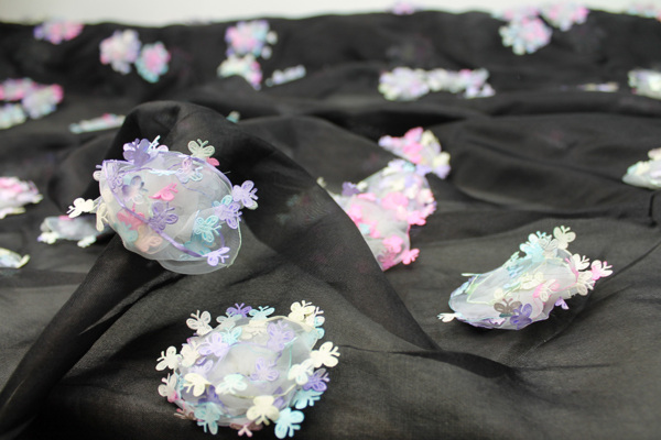 Black Silk Organza with Pastel Butterfly Pom-Poms fabric