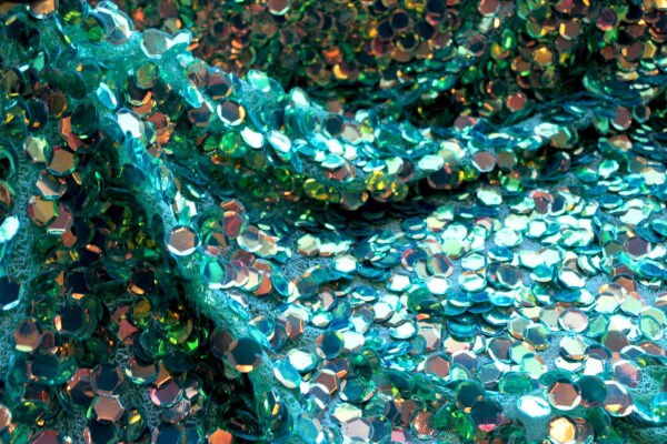 Iridescent Green Disc Sequin on Mesh fabric