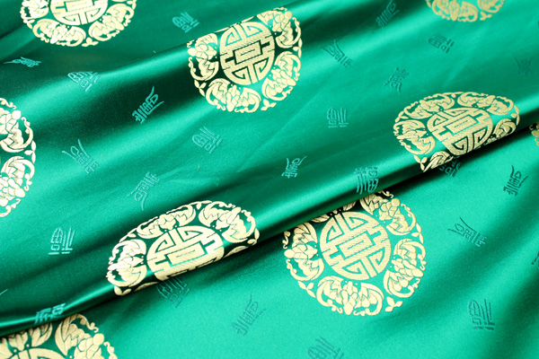 Chinese Brocade - Green With Gold Orb fabric