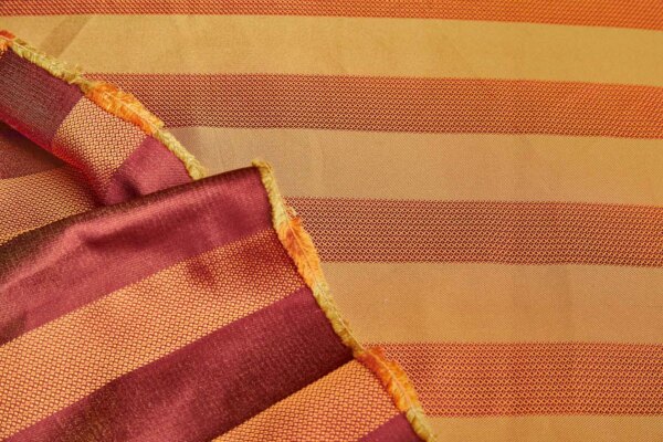 Reversible Satin Stripe Brocade in Rust Red, Orange and Gold fabric