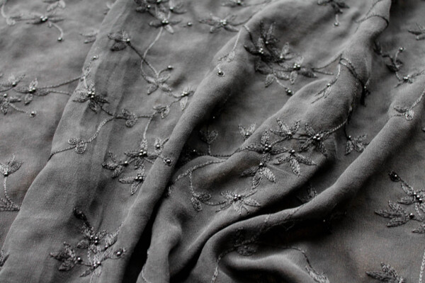Black Floral Embroidered Silk Chiffon with Pearls fabric