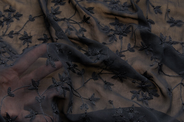 Black Floral Embroidered Silk Chiffon with Pearls fabric