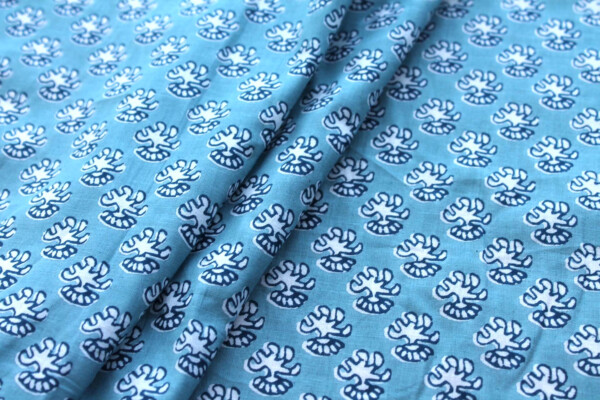 Printed Cotton Lawn - Off White and Dark Blue on Pale Blue fabric