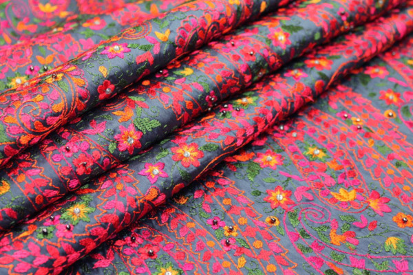 Embroidered Dupion - Multi Coloured on Blue fabric