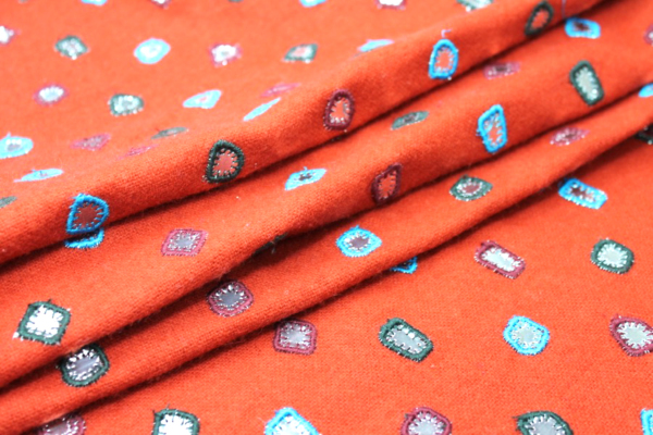 Embroidered Orange Wool with Mirrors fabric