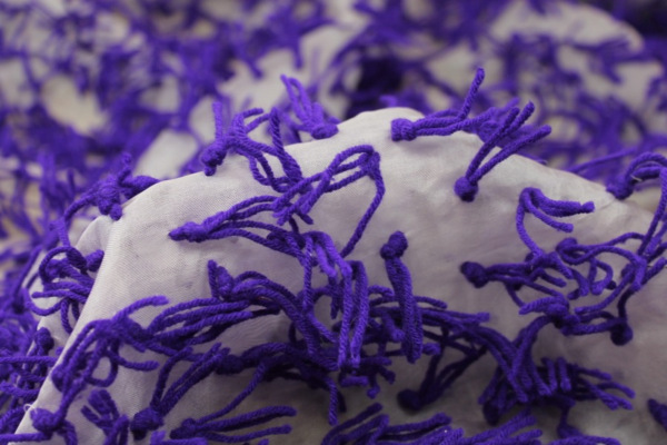 Yarn Tassels on Silk Organza - Purple on Lilac fabric