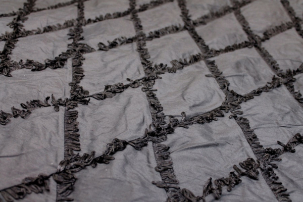 Silk Dupion with Fringed Harlequin Pintuck - Black fabric