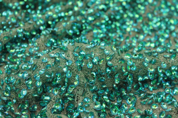 Oval Cupped Iridescent Metallic Peacock Sequins on Mesh fabric