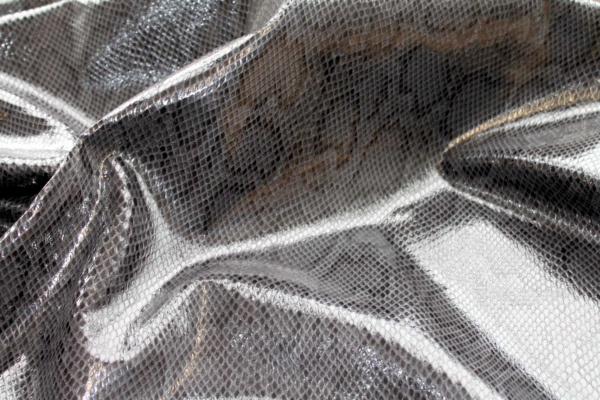 Printed and Textured Snakeskin Leatherette - Black fabric