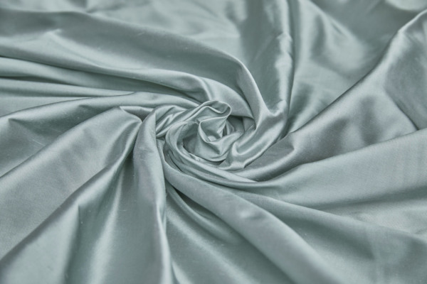 Silk Dupion - Sage Green shot Lilac fabric